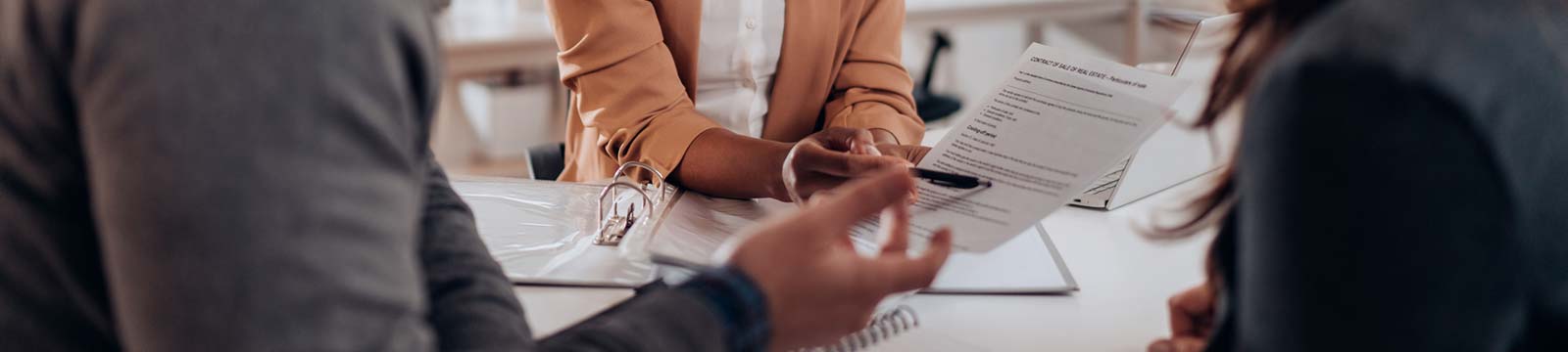 A couple applying for a loan in an office