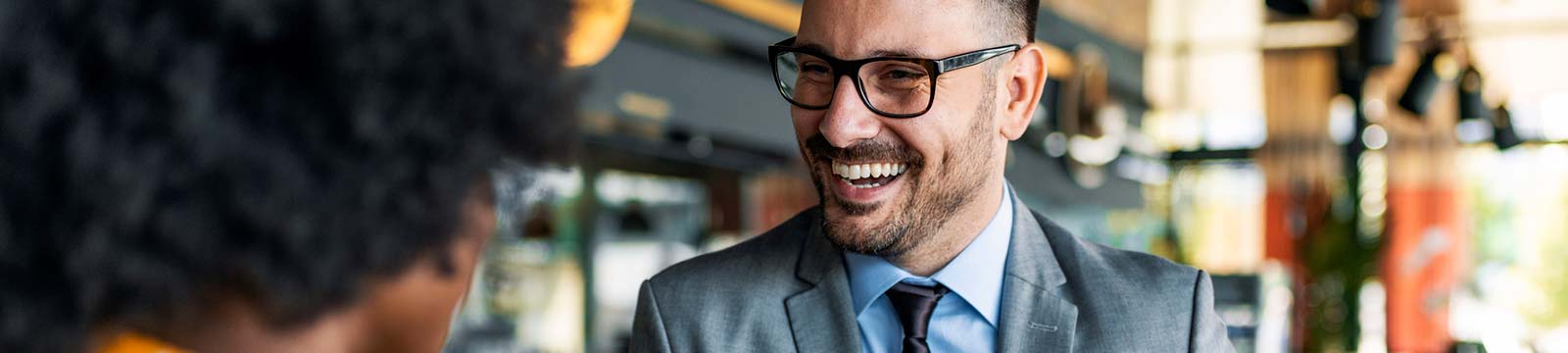 Businessman meeting a lady in a restaurant